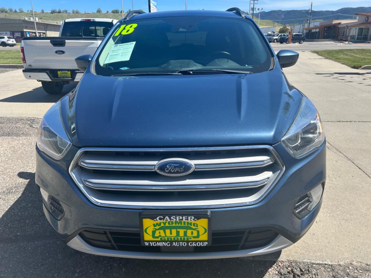 2018 BLUE Ford Escape SEL (1FMCU9HD6JU) with an L4, 1.5L engine, Automatic transmission, located at 3030 CY Ave, Casper, WY, 82604, (307) 265-3830, 42.827816, -106.357483 - Photo#2